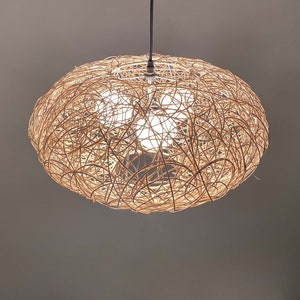 rattan pendant light
handwoven lighting
boho decor
rustic light fixture
handmade pendant
ceiling lamp
artisan lighting
eco friendly lamp
coastal chandelier
farmhouse lighting
rattan pendant light,handmade woven lampshade,  
bohemian ceiling light, eco-friendly lighting, natural fiber lamp,  
jungle decor, sustainable home decor, macrame pendant light,  
tropical chandelier, 
Chandelier
Ceiling Light Fixture
Pendant Light
Modern Chandelier
Vintage Chandelier
Rustic Chandelier
Farmhouse Chandelier