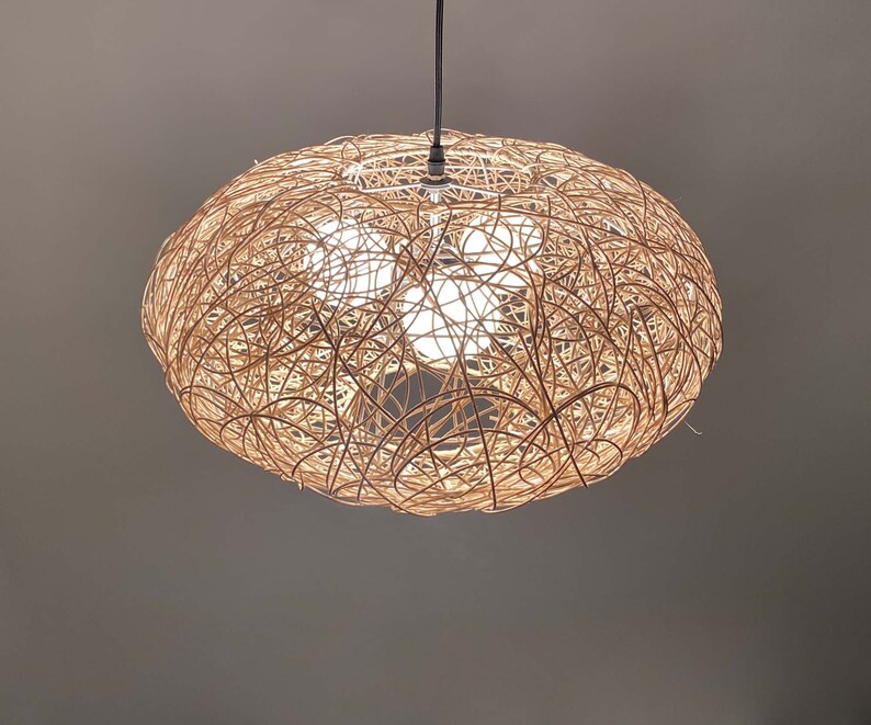 rattan pendant light
handwoven lighting
boho decor
rustic light fixture
handmade pendant
ceiling lamp
artisan lighting
eco friendly lamp
coastal chandelier
farmhouse lighting
rattan pendant light,handmade woven lampshade,  
bohemian ceiling light, eco-friendly lighting, natural fiber lamp,  
jungle decor, sustainable home decor, macrame pendant light,  
tropical chandelier, 
Chandelier
Ceiling Light Fixture
Pendant Light
Modern Chandelier
Vintage Chandelier
Rustic Chandelier
Farmhouse Chandelier