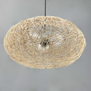 rattan pendant light
handwoven lighting
boho decor
rustic light fixture
handmade pendant
ceiling lamp
artisan lighting
eco friendly lamp
coastal chandelier
farmhouse lighting
rattan pendant light,handmade woven lampshade,  
bohemian ceiling light, eco-friendly lighting, natural fiber lamp,  
jungle decor, sustainable home decor, macrame pendant light,  
tropical chandelier, 
Chandelier
Ceiling Light Fixture
Pendant Light
Modern Chandelier
Vintage Chandelier
Rustic Chandelier
Farmhouse Chandelier