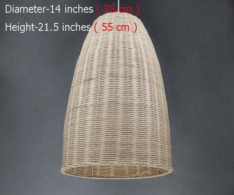 May include: A woven wicker pendant light shade in a natural beige color. The shade is 14 inches in diameter and 21.5 inches tall.