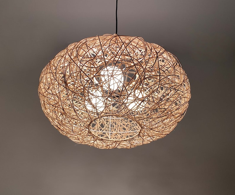 rattan pendant light
handwoven lighting
boho decor
rustic light fixture
handmade pendant
ceiling lamp
artisan lighting
eco friendly lamp
coastal chandelier
farmhouse lighting
rattan pendant light,handmade woven lampshade,  
bohemian ceiling light, eco-friendly lighting, natural fiber lamp,  
jungle decor, sustainable home decor, macrame pendant light,  
tropical chandelier, 
Chandelier
Ceiling Light Fixture
Pendant Light
Modern Chandelier
Vintage Chandelier
Rustic Chandelier
Farmhouse Chandelier