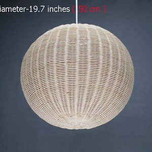 May include: A white wicker pendant light with a round shape and a diameter of 19.7 inches (50 cm).