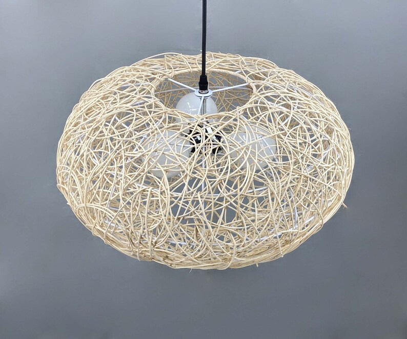 rattan pendant light
handwoven lighting
boho decor
rustic light fixture
handmade pendant
ceiling lamp
artisan lighting
eco friendly lamp
coastal chandelier
farmhouse lighting
rattan pendant light,handmade woven lampshade,  
bohemian ceiling light, eco-friendly lighting, natural fiber lamp,  
jungle decor, sustainable home decor, macrame pendant light,  
tropical chandelier, 
Chandelier
Ceiling Light Fixture
Pendant Light
Modern Chandelier
Vintage Chandelier
Rustic Chandelier
Farmhouse Chandelier