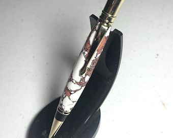 Executive pen with gold fittings and white with peach clay barrel