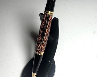 Gatsby twist pen with gloss black and gold fittings and rose barrel