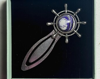 Chrome helm bookmark with white, black and purple cabochon