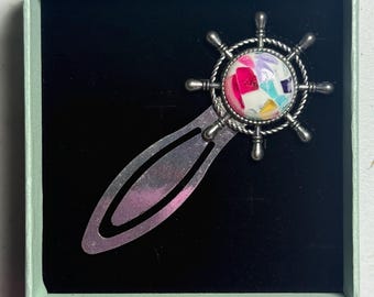 Chrome helm bookmark with stained glass cabochon