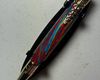 Medical pen gold with yellow, red and blue clay barrel