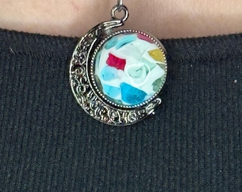 Silver moon spinner necklace with pink and stained glass cabochons
