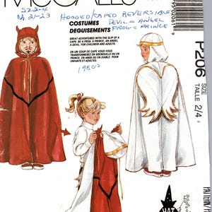 May include: McCall's costume pattern P206, featuring reversible hooded capes for devil, angel, and prince costumes. The illustration shows children's costumes with red and white capes. Includes text: "Great adventures with the slip of a cape."