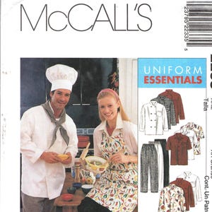 May include: A McCall's 2233 sewing pattern envelope for Uniform Essentials, featuring illustrations of chef coats, pants, aprons, and hats. The cover shows a person in a white chef coat and hat with a checkered neckerchief, and another in a vegetable-print apron.