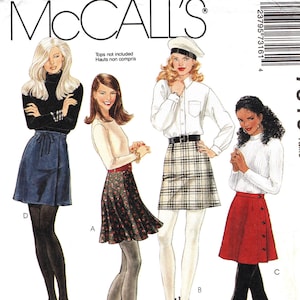 May include: McCall's sewing pattern for skirts. The pattern shows illustrations of four skirt styles, including a denim skirt, a floral print skirt, a plaid skirt, and a red button-up skirt. The text reads "2 Hour Skirt".