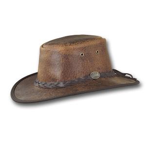 May include: A brown leather cowboy hat with a braided leather band and a metal logo that says "Akubra".