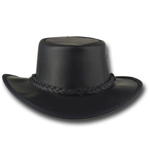 May include: A black leather cowboy hat with a braided band.