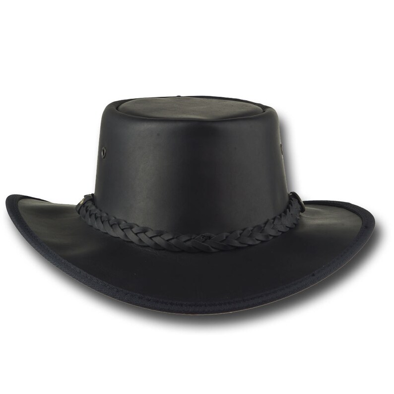 May include: A black leather cowboy hat with a braided band.
