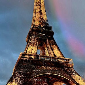 The Eiffel Tower at Night by the Seine River