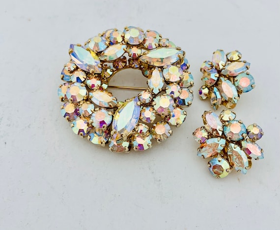 Signed Sherman Aurora Borealis crystal brooch and