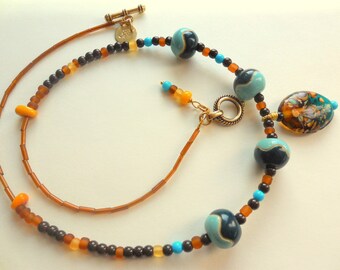 Colorful ceramic pendant necklace. Green orange lampwork necklace. Turquoise brown necklace. Glass necklace.