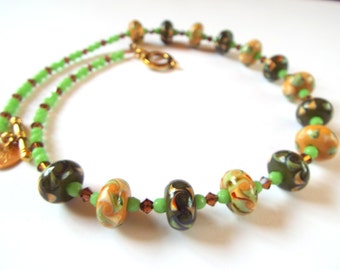 Ceramic green and cream necklace with czech beads and swarovski bicones. Colorful necklace  Swarovski necklace.
