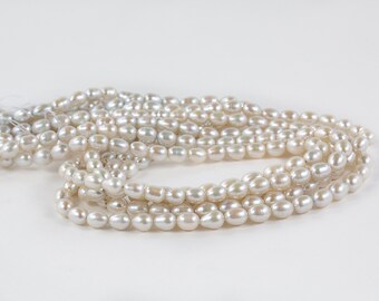 Pale Blue 7 - 7.5mm  Oval Pearls, Freshwater Cultured Pearl Beads, nicely shaped oval/rice pearls, 16 inch strand, #6218