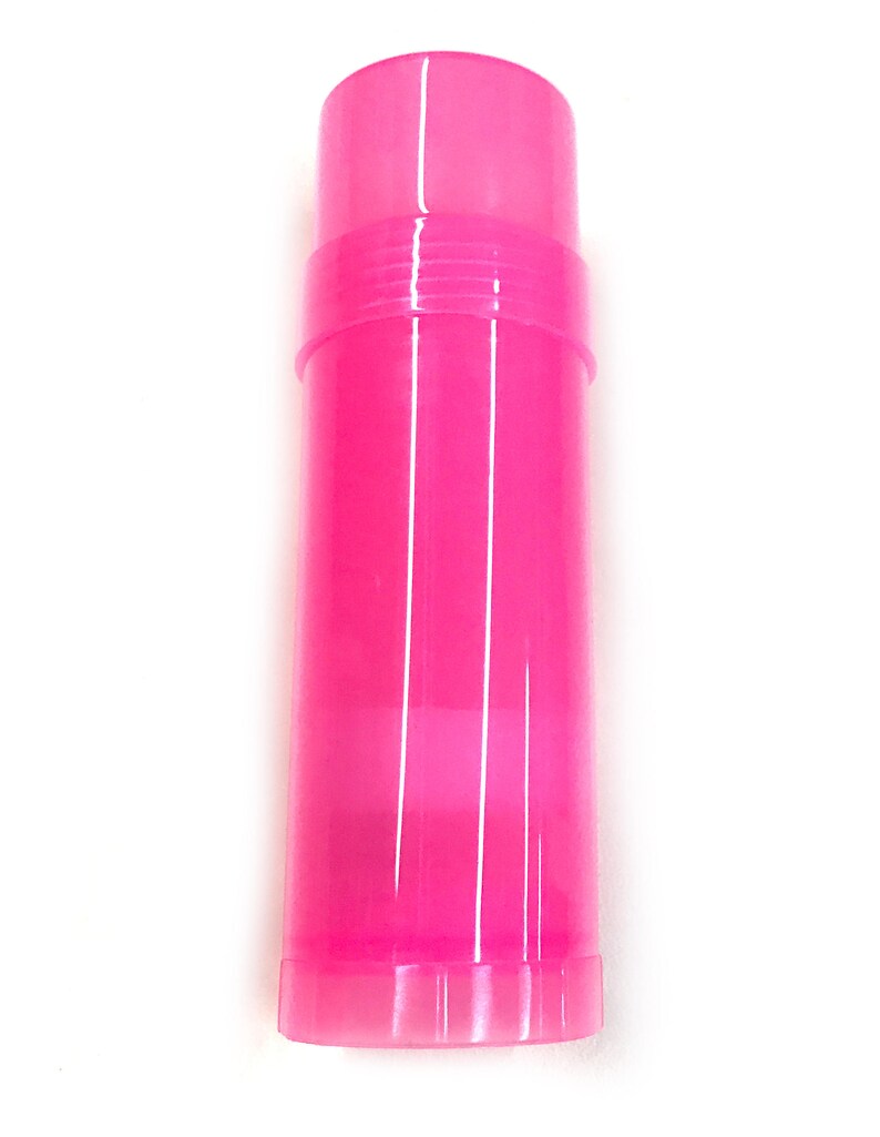 May include: A bright pink plastic tube container with a screw-on lid. The container is empty and ready to be filled with a product like lip balm or lotion.