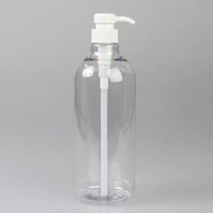 May include: A clear plastic bottle with a white pump dispenser. The bottle is empty and ready to be filled with liquid soap, lotion, or other products.