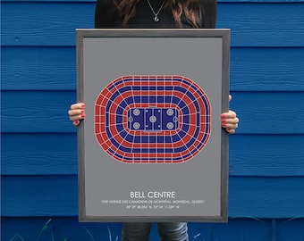May include: A framed print of the Bell Centre hockey arena in Montreal, Quebec. The print features a stylized map of the arena in red and blue colors. The text below the map reads "BELL CENTRE 1909 AVENUE DES CANADIENS-DE-MONTREAL MONTREAL, QUEBEC 45° 29′ 48.396 N. 73° 34′ 11.339 W"