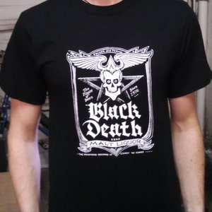 May include: Black t-shirt with a white graphic of a skull and crossbones with the text "Black Death Malt Liquor" and "The Plague Beers Since 1976"