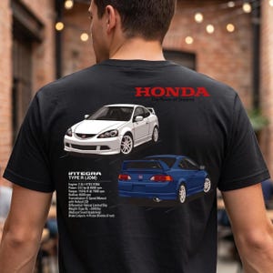 May include: A black t-shirt featuring a white Honda Integra Type R, a blue Honda Integra Type R, and the text Honda The Power of Dreams. Technical specifications include a 2.0L engine, 222 hp, 150 lb-ft torque, 8000 rpm redline, 6-speed manual transmission.