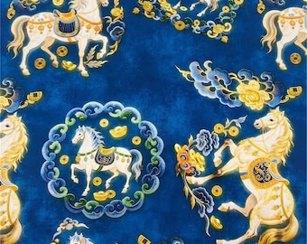 May include: A vibrant blue fabric featuring a repeating pattern of white horses with ornate saddles and gold accents. The design includes floral and cloud motifs, along with gold coins, creating a rich, detailed aesthetic.
