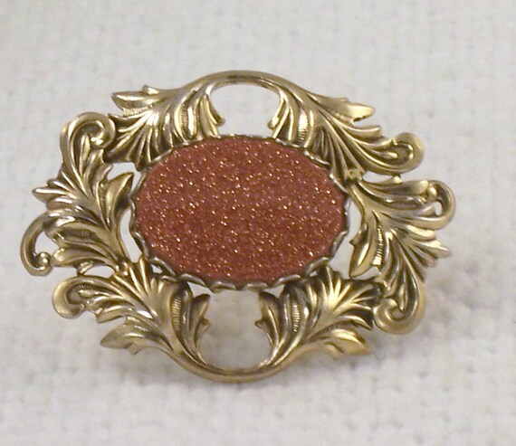 Vintage Art Deco Goldstone Brooch Pin with Curlin… - image 1