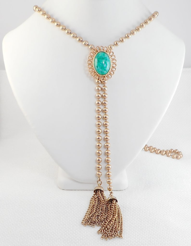 Delizza and Elster for Avon Ming Green Slide Tassel Necklace 1973 Ming Green D /& E Lariat Peking Glass Tassel Necklace Book Item Necklace