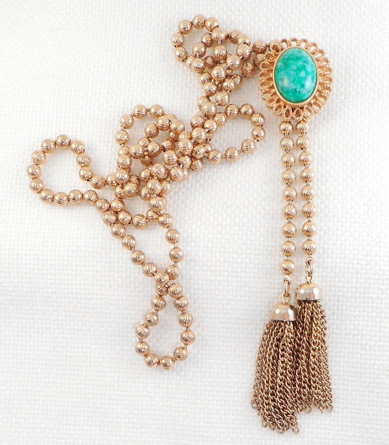 Delizza and Elster for Avon Ming Green Slide Tassel Necklace 1973 Ming Green D /& E Lariat Peking Glass Tassel Necklace Book Item Necklace