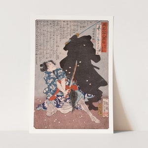 May include: A Japanese woodblock print depicting a samurai in a blue and white patterned robe, wielding a sword. The samurai is facing a shadowy figure, also wielding a sword. The print is titled "The Samurai's Shadow" in Japanese characters.