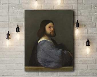 Può includere: Un dipinto di un uomo in una veste blu, su uno sfondo scuro. L'uomo ha la barba e guarda a destra. Il dipinto è in una cornice semplice.
