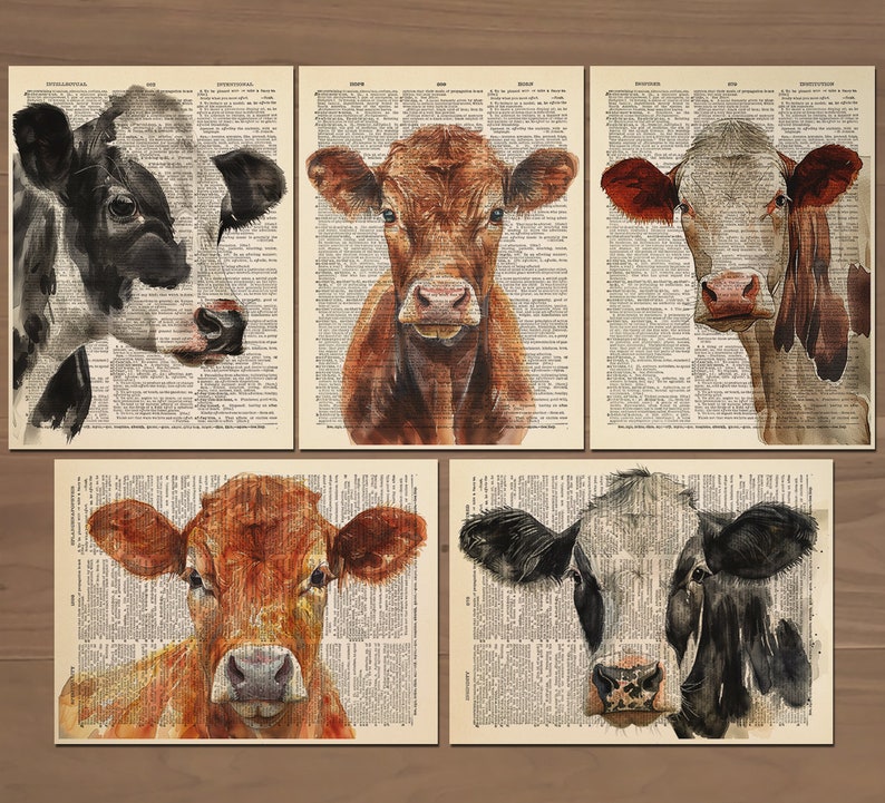 May include: Five watercolor prints of cow faces, each set against a backdrop of vintage dictionary pages. The cows feature various color patterns, including black and white, and shades of brown and red. The artwork has a rustic, farmhouse aesthetic.