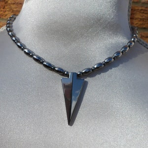 Silver hematite necklace with arrow pendant