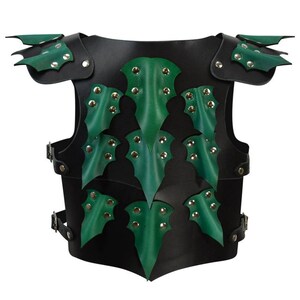 May include: Black leather armor with green leather accents and metal studs. The armor has a dragon scale design.