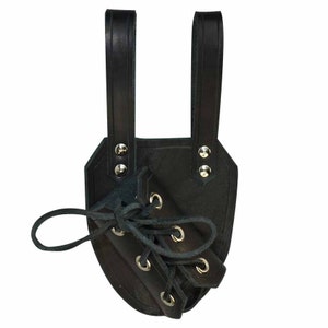 May include: Black leather sword scabbard with a laced flap and two straps. The scabbard has silver rivets and is designed to be worn on a belt.