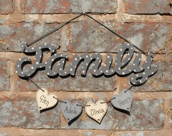 wooden family word plaque with hanging personalised hearts, personalied gift, new house, new baby, birthday gift, personalized plaque