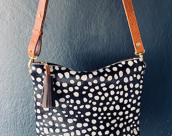 May is a good size cross body day bag which is easily dressed up for an evening outfit too.