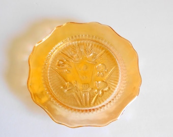 Talerz ze szkła bursztynowego z irysami, Talerz szklany Jeanette, Szkło karnawałowe, Talerz bursztynowy