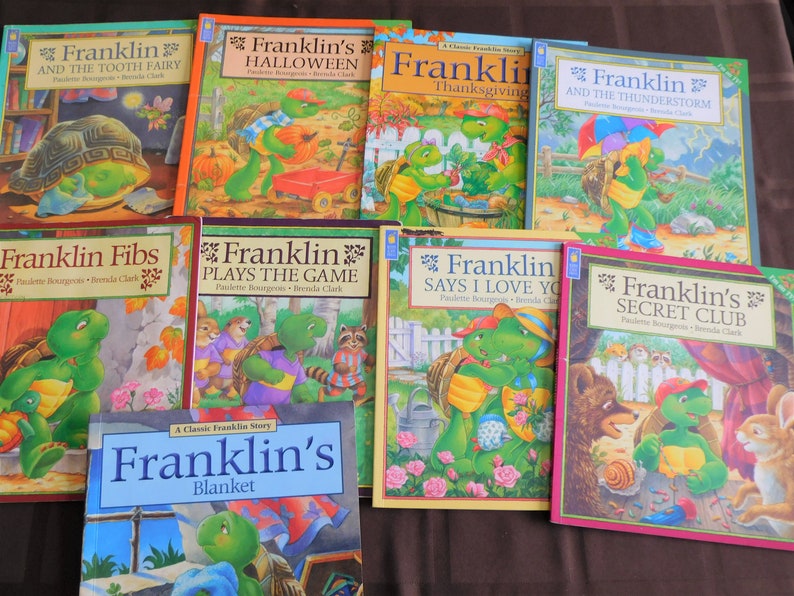 May include: A collection of children's books featuring the character Franklin the Turtle. The covers display colorful illustrations and titles such as "Franklin's Halloween," "Franklin Says I Love You," and "Franklin and the Tooth Fairy."