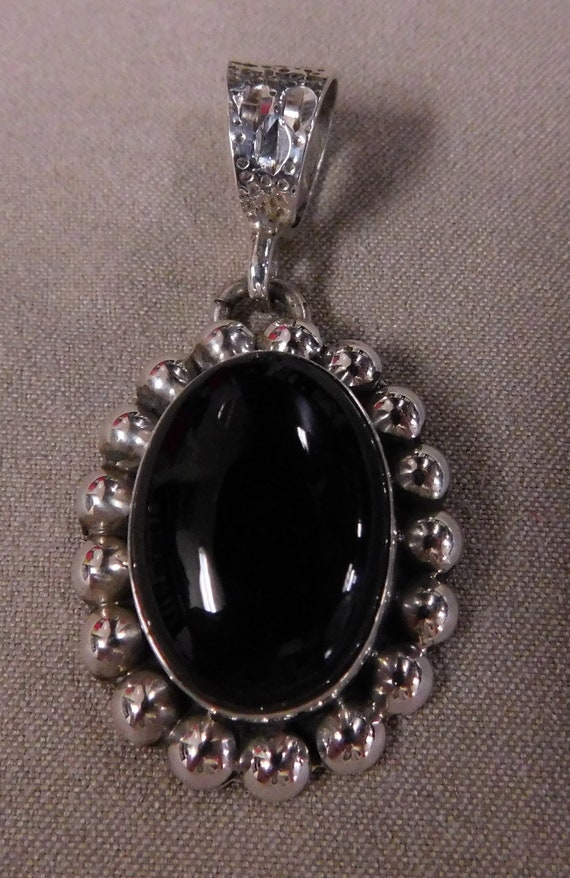 Black Onyx and Sterling Silver Oval Pendant +