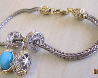 Sterling Silver Bracelet with Two Charms +