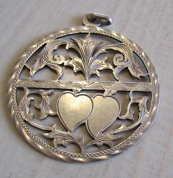 Sterling Silver Two Hearts Pendant from Mexico +