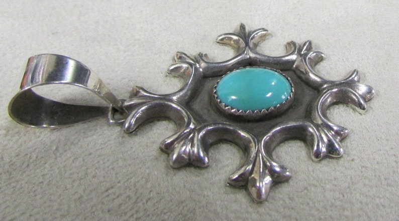 Cast Sterling Silver and Turquoise Pendant By Shane