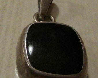 Sterling Silver and Black Onyx Pendant +
