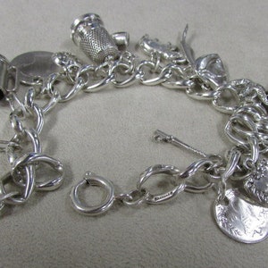 Large Wonderful Sterling Silver Charm Bracelet +
