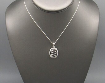 Sterling Silver Pendant with Faceted Black and Clear Stones